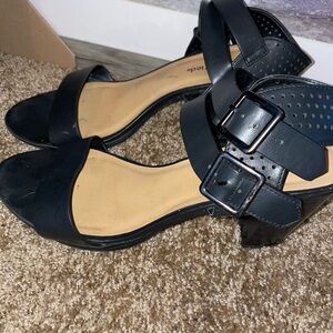 Sexy low chunky black heels with side buckle.